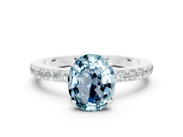 Oval Cut Aquamarine Solitaire Engagement Ring with Pavé Band and Four-Prong Setting Platinum