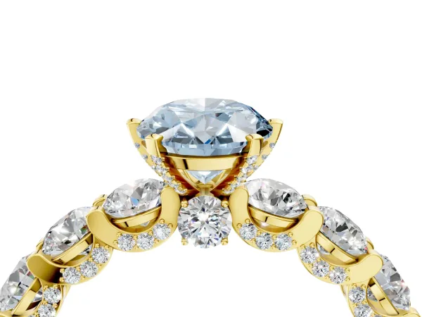 Fancy Blue Oval Cut Diamond Side Stone Engagement Ring with Four-Prong Setting Yellow gold
