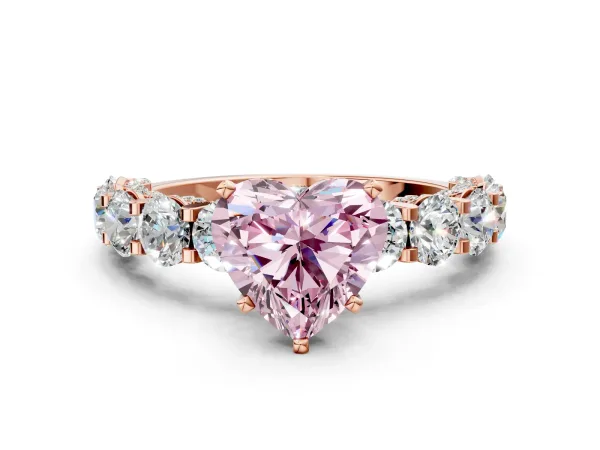 Fancy Pink Heart Cut Diamond Side Stone Engagement Ring with Four-Prong Setting Rose gold