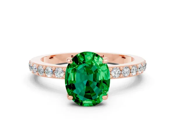 Oval Cut Emerald Solitaire Engagement Ring with Pavé Band and Four-Prong Setting Rose gold