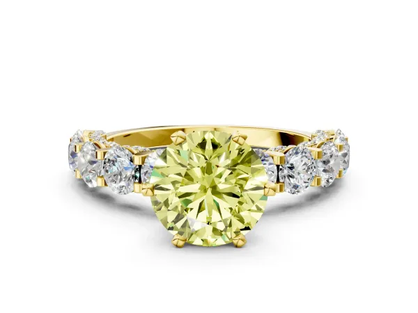 Fancy Yellow Round Cut Diamond Side Stone Engagement Ring with Four-Prong Setting Yellow gold
