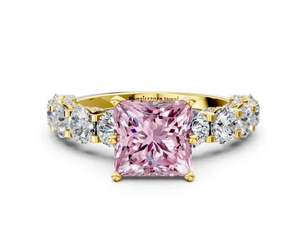 Fancy Pink Princess Cut Diamond Side Stone Engagement Ring with Four-Prong Setting Yellow gold